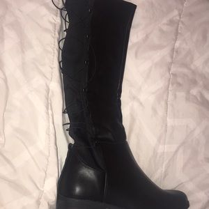 Black boots with lace up backs